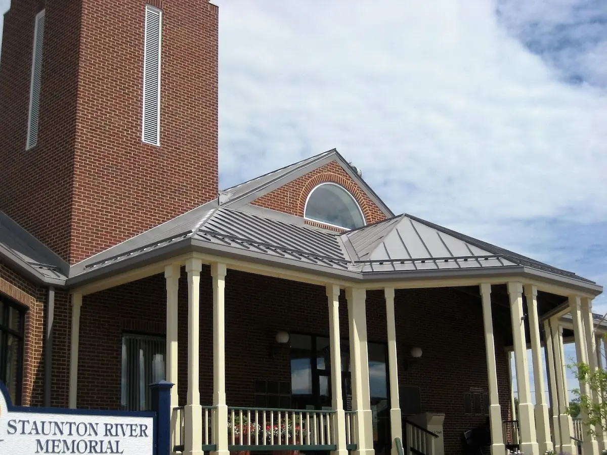 Skilled roofing craftsmen working on a residential roof in Frankfort Square